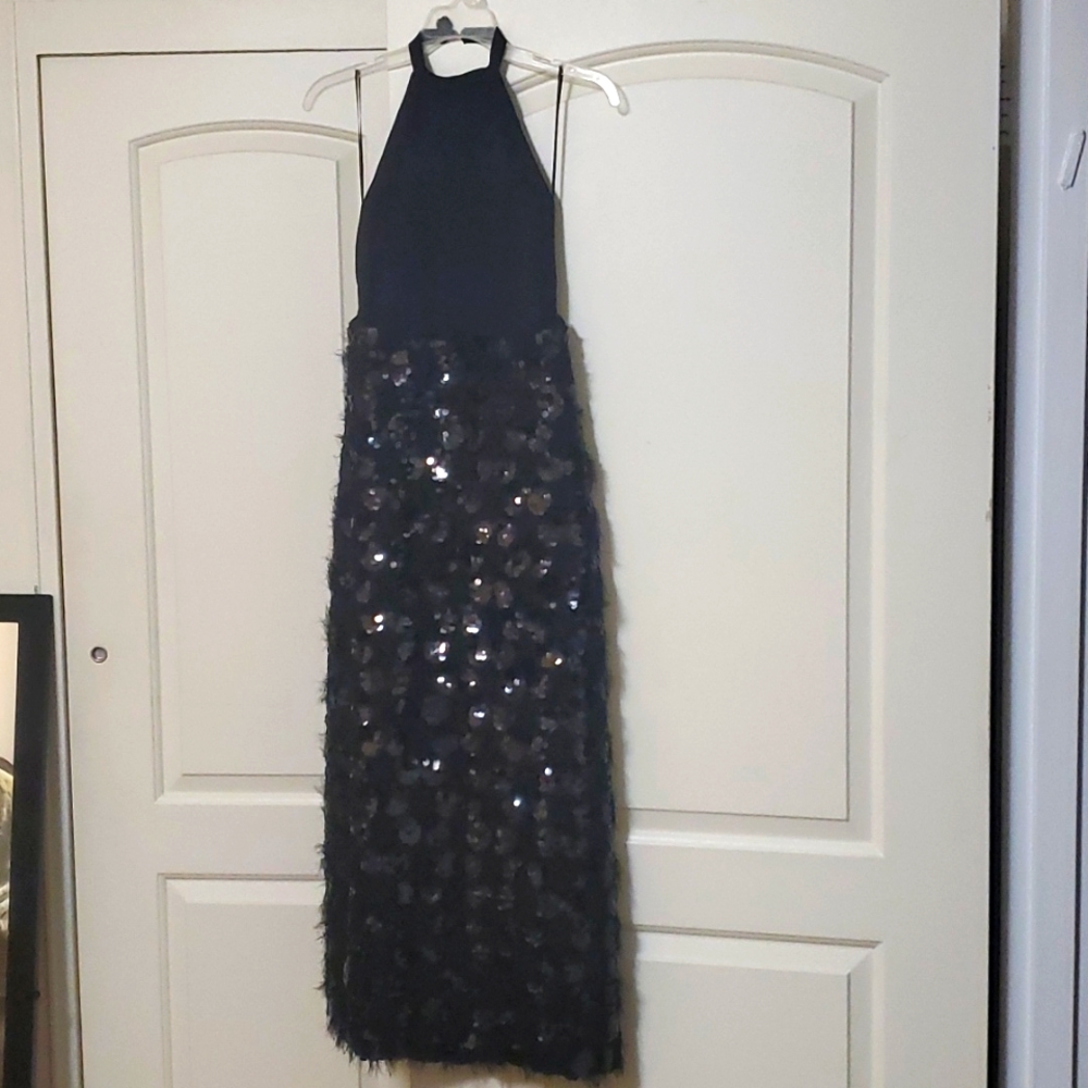 Black sequin halter dress.